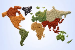 World map with spices and herbs